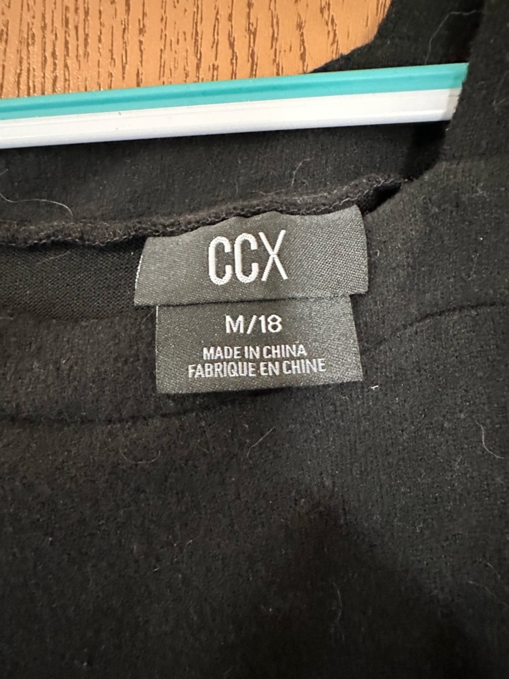 CHANEL Black One-Shoulder Sweatshirt with Strap Detail - Picture 3 of 4